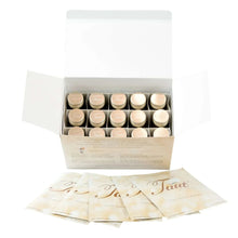 Open box with multiple round cream-colored jars and sheet mask packets.