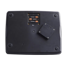 Back view of black digital kitchen scale with rubber feet and control panel