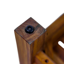 Teak bench corner post detail with round screw fitting and visible wood grain