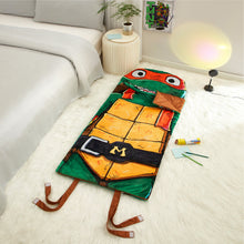 Kids turtle faux-fur slumber bag with hood, orange face, and attached strap legs