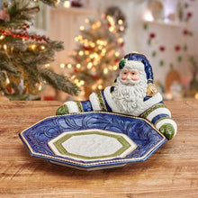 Blue ceramic Santa serving bowl with embossed swirls and green-trimmed center