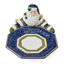 Blue ceramic serving bowl with Santa figurine and green-trimmed octagon dish
