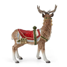 Standing deer candle holder side view with red saddle and upright candle