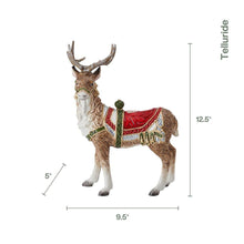 Standing deer candle holder, full view with red drape and green trim