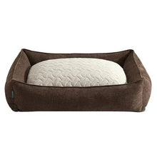 Reversible pet bed with dark brown walls and white quilted inner cushion