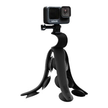 All-in-one suction tripod mount, black, supporting a compact action camera on top.