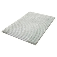 Textured stripe microfiber bath rug, rectangular flat lay with vertical stripe texture