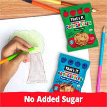 Crunchables organic fruit crisps snack packs beside school craft paper.