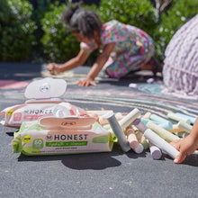 Plant-based hydrate + cleanse wipes pack on outdoor mat, 60 wipes