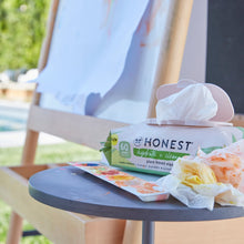 Plant-based hydrate + cleanse wipes pack on table, 60 wipes, leaf print