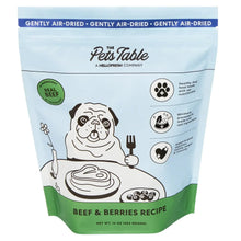 Air-dried dog food pouch for beef and berries, green bottom seal, dog graphic on front.