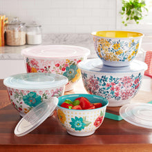 Floral melamine mixing bowls set with matching clear lids and colorful inner linings