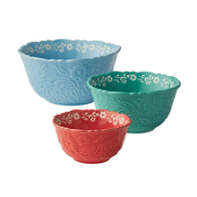 Set of 3 embossed stoneware serve bowls: light blue, green, and red.