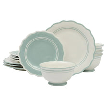 Ceramic dinnerware set with sage blue scalloped plates and matching bowls