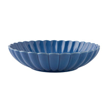 Blue stoneware serving bowl with fluted ridges and scalloped rim