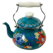 Teal enamel tea kettle with colorful floral dahlias, white knob lid, curved metal handle.