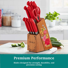Wooden knife block set with floral panel and red-handled knives, stainless steel blades