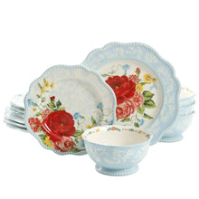 Floral blue dinnerware set with scalloped plates and matching serving bowl