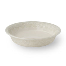 Cream stoneware pie pan with embossed lace pattern, shallow 10-inch tart dish
