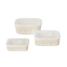 Set of 3 cream lace baking dishes with transparent plastic lids, stacked
