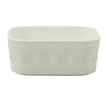 Cream lace-pattern baking dish with smooth interior, rectangular