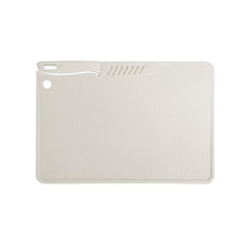 White cutting board with corner handle hole and ridged hand-cut section