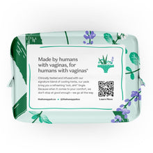 Winged herbal pads pouch back, teal with purple flower print and text panel