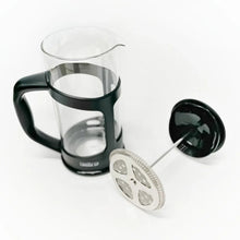 French press brewer glass carafe with black handle and stainless filter disc
