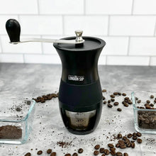 London Sip manual coffee grinder, black with top knob and front grind chamber