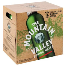Mountain Valley spring water 12-pack carton with green aluminum bottles, side view
