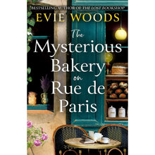 Paperback book cover for The Mysterious Bakery on Rue de Paris by Evie Woods