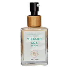 Vitamin Sea face serum bottle with black pump and wood-style cap