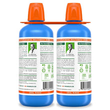 TheraBreath oral rinse bottles with back labels, orange caps, blue bottles