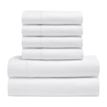 Stacked white sheet set folds, smooth woven fabric