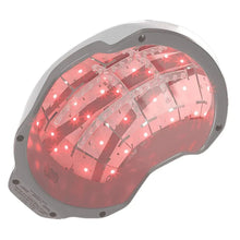 Laser hair growth cap with red glowing LED panel and internal grid detail