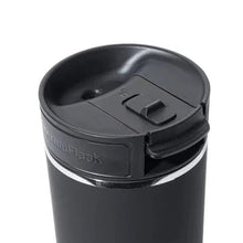 Black Sip-N-Lok lid close-up with sip button and hinge-style latch.
