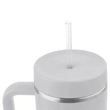 White tumbler lid with clear drinking straw and silver rim ring