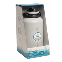 ThermoFlask 64 oz double-wall insulated bottle with straw lid, shown in retail box