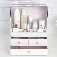 White large beauty case with clear lid, interior shelves, and three drawer knobs