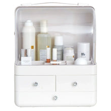 White large beauty case with clear lid and three drawer fronts, shiny knobs