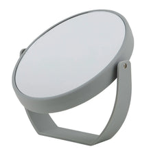 Thinkspace Beauty oval vanity mirror on gray stand, side view