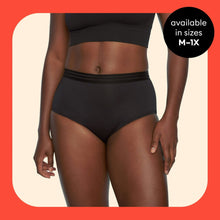 Black hi-waist incontinence underwear on model, full brief with smooth waistband
