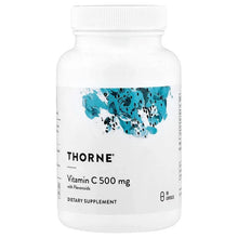Thorne Vitamin C supplement bottle, white with blue label and THORNE logo