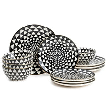 Black-and-white ceramic dinnerware set with medallion triangle pattern plates and bowls