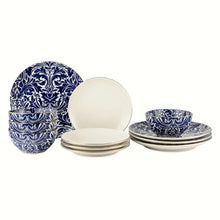 Blue and white ceramic dinnerware with patterned bowls and stacked plates