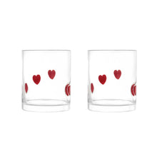 Set of 2 clear drinking glasses with red heart charm decals on the front