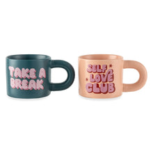 Pair of stoneware mugs: dark green “Take a Break” and pink “Self Love Club”
