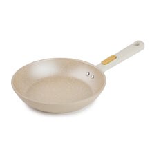 Taupe speckled non-stick fry pan with gold handle and ceramic granite coating