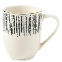 Stoneware mug with black drip pattern, white handle, 15 fl oz