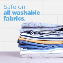 Laundry detergent for all washable fabrics, folded clothes stack in blue and gray.